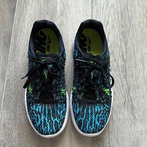 Nike Women’s Blue Black Athletic Sneakers with Neon Green Accents